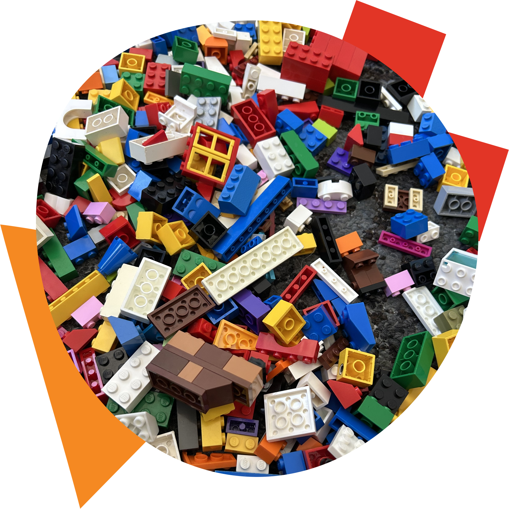 a photograph of lots of brightly coloured lego blocks on carpet